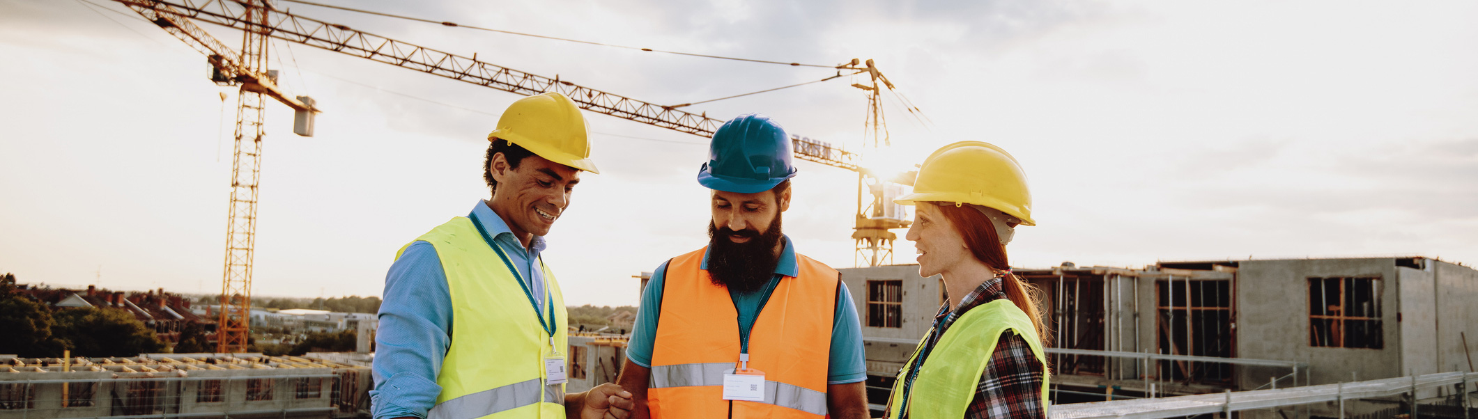 Three construction workers on site