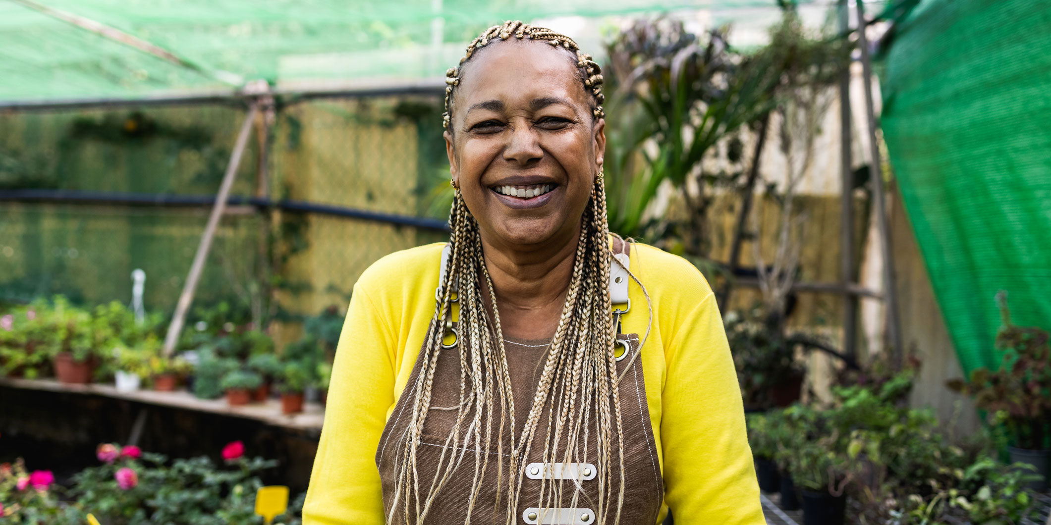Smiling gardens shop owner